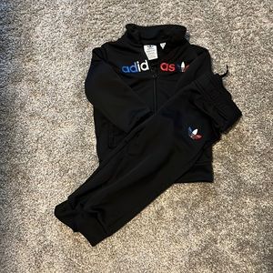 Adidas track suit